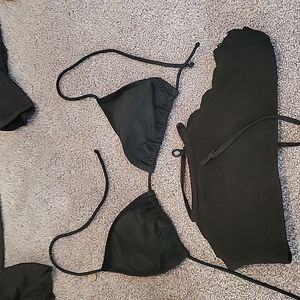 Two black swim suit tops